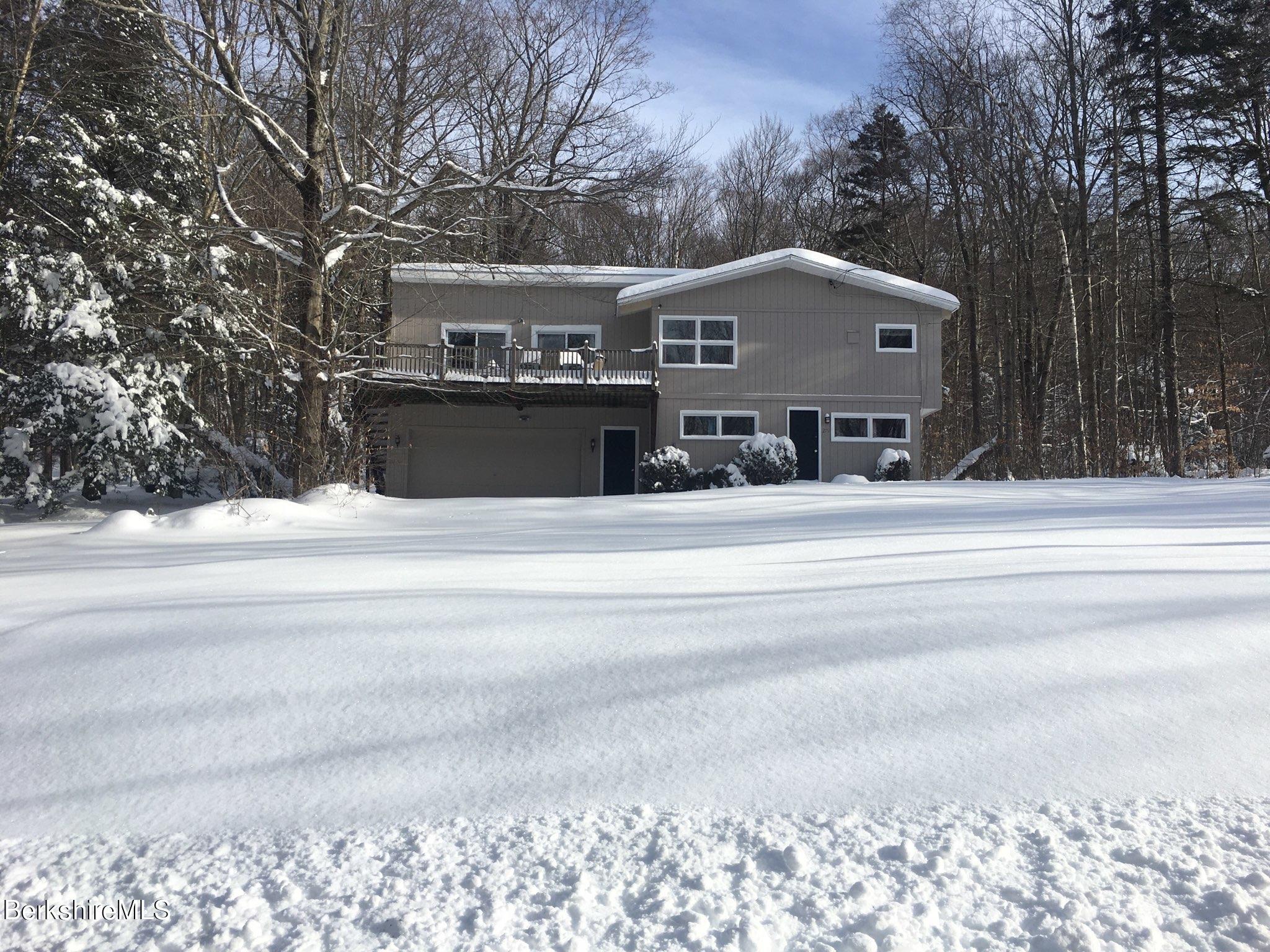 279 Heartwellville View Road Readsboro, VT 05350 - Photo 1 of 42 a front view of a house with a yard