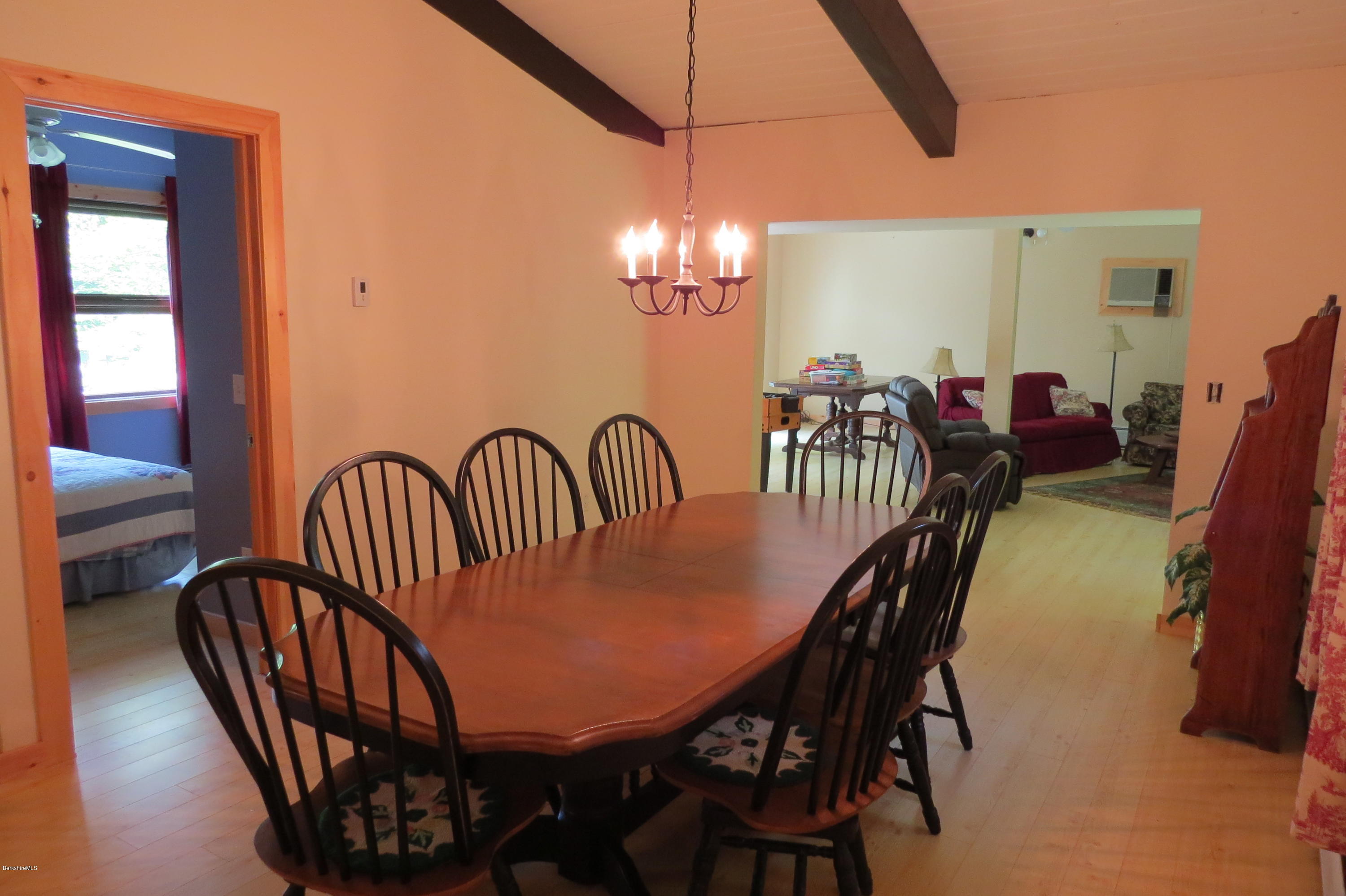 279 Heartwellville View Road Readsboro, VT 05350 - Photo 16 of 42 a view of a dining room with furniture and chandelier