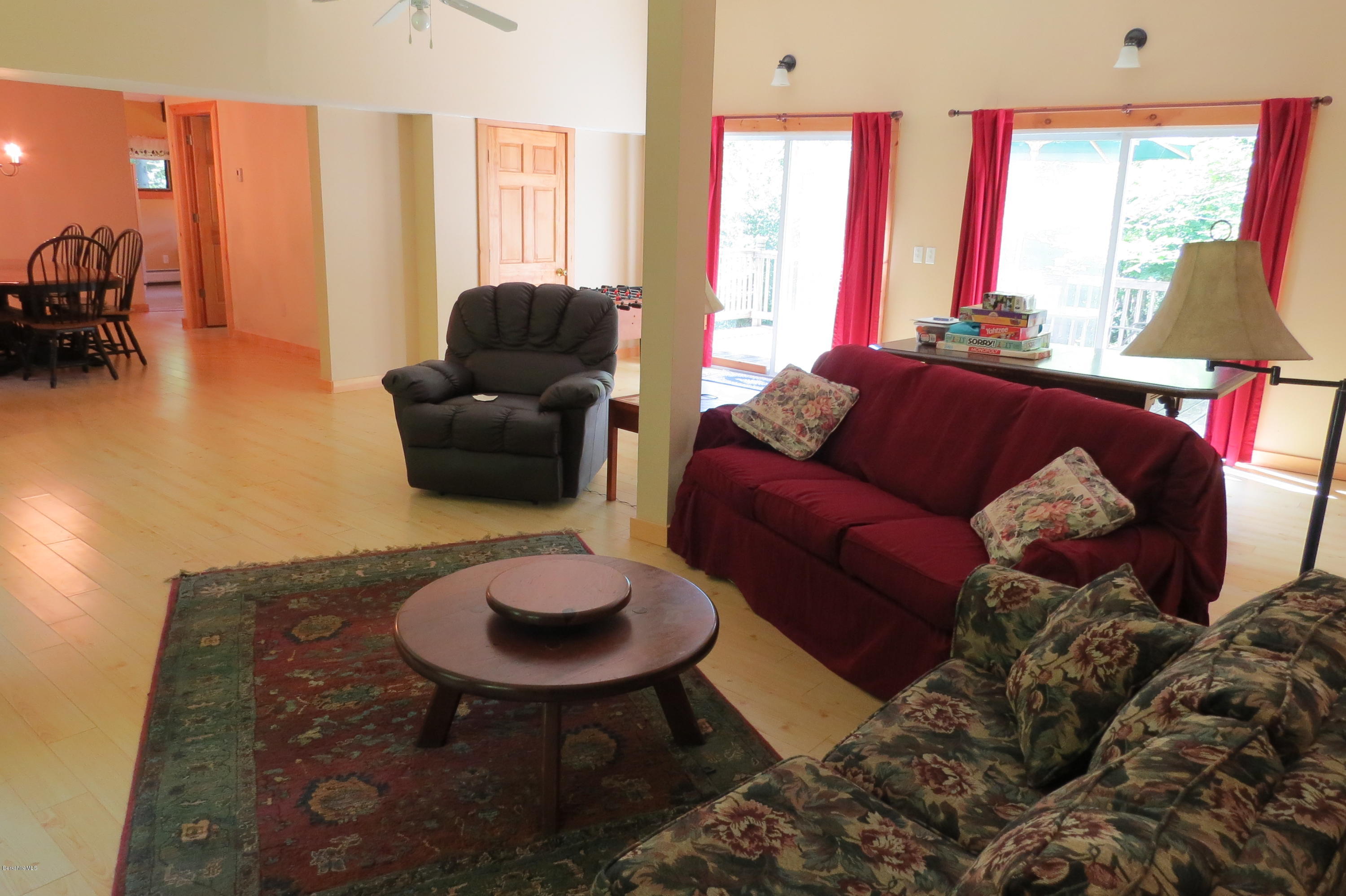 279 Heartwellville View Road Readsboro, VT 05350 - Photo 23 of 42 a living room with furniture and a large window