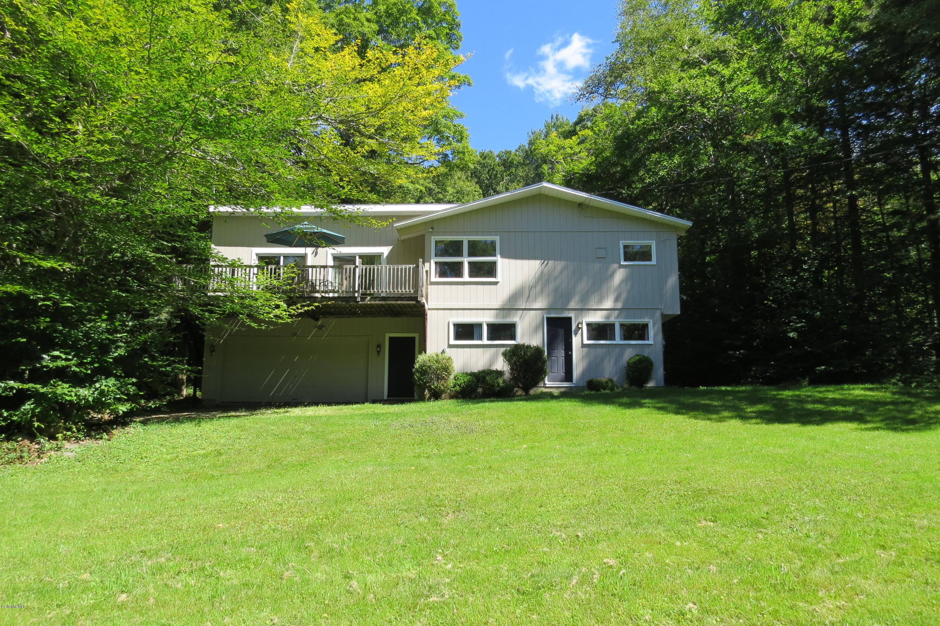 279 Heartwellville View Road Readsboro, VT 05350 - Photo 5 of 42 a view of a house with a big yard