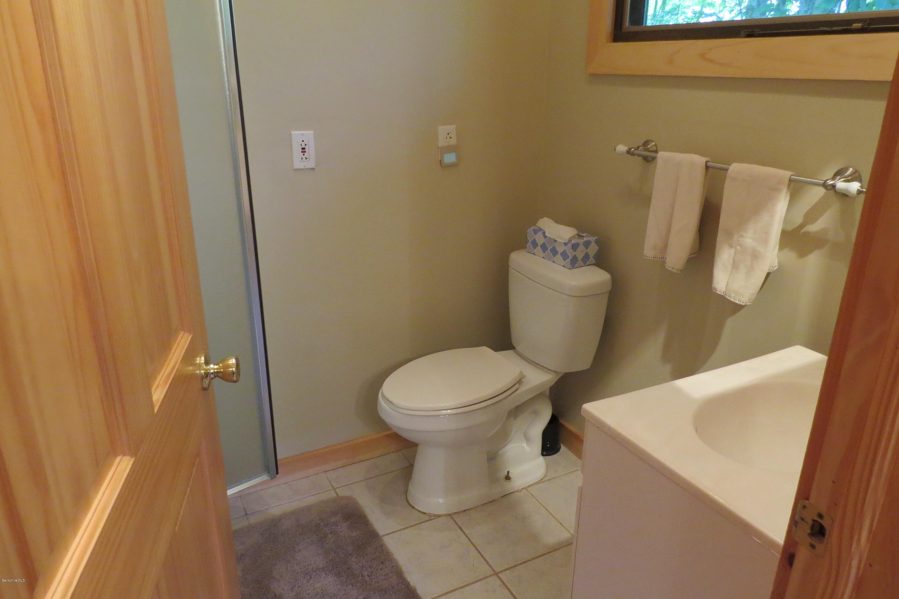 279 Heartwellville View Road Readsboro, VT 05350 - Photo 7 of 42 a bathroom with a toilet and a sink