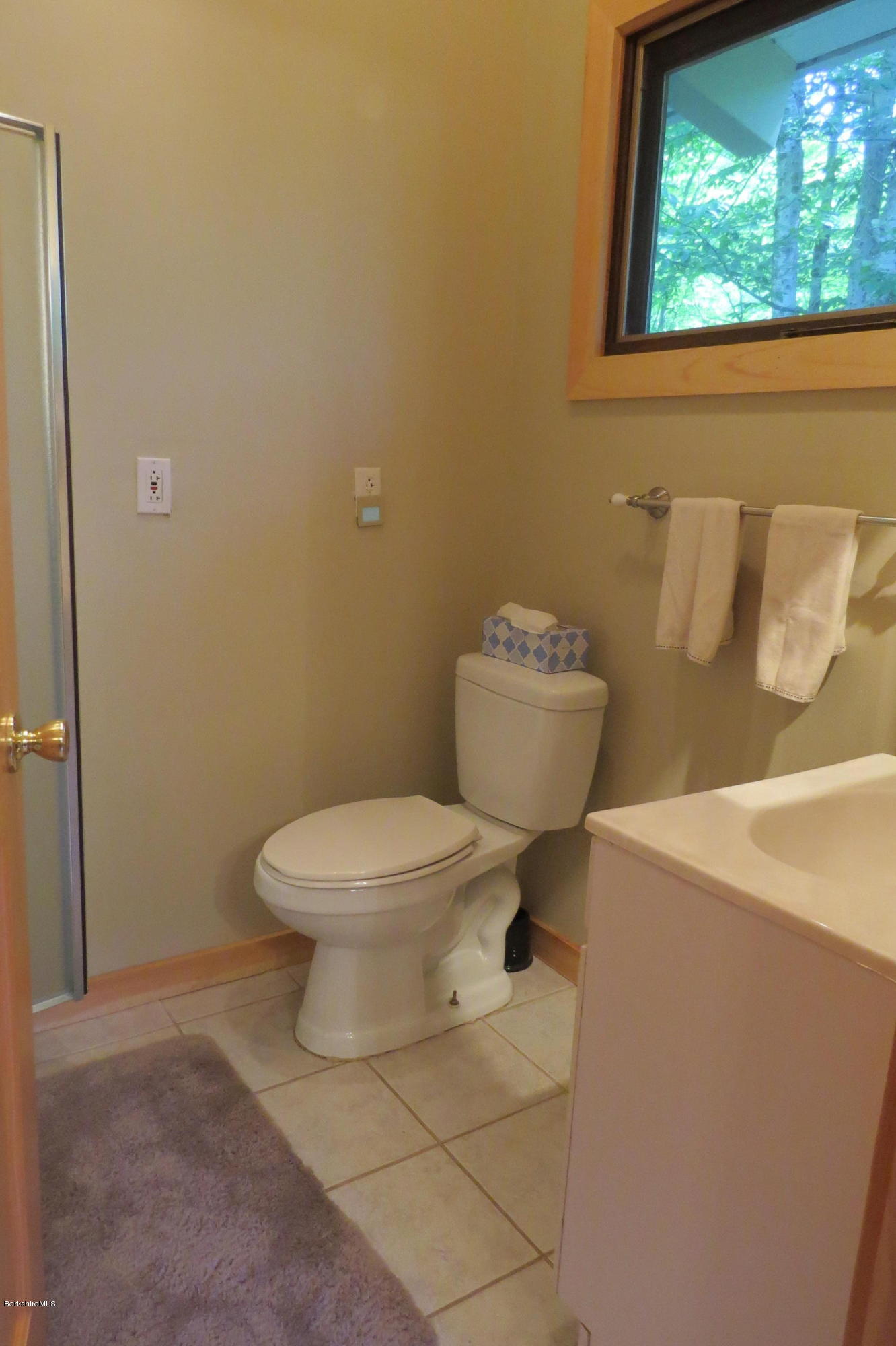 279 Heartwellville View Road Readsboro, VT 05350 - Photo 8 of 42 a white toilet sitting next to a bathroom sink