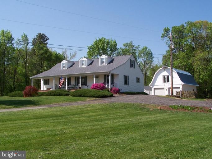 9425 Mackall Road St. Leonard, MD 20685 - Photo 1 of 26 Enjoy Cool Evenings on the Front Porch