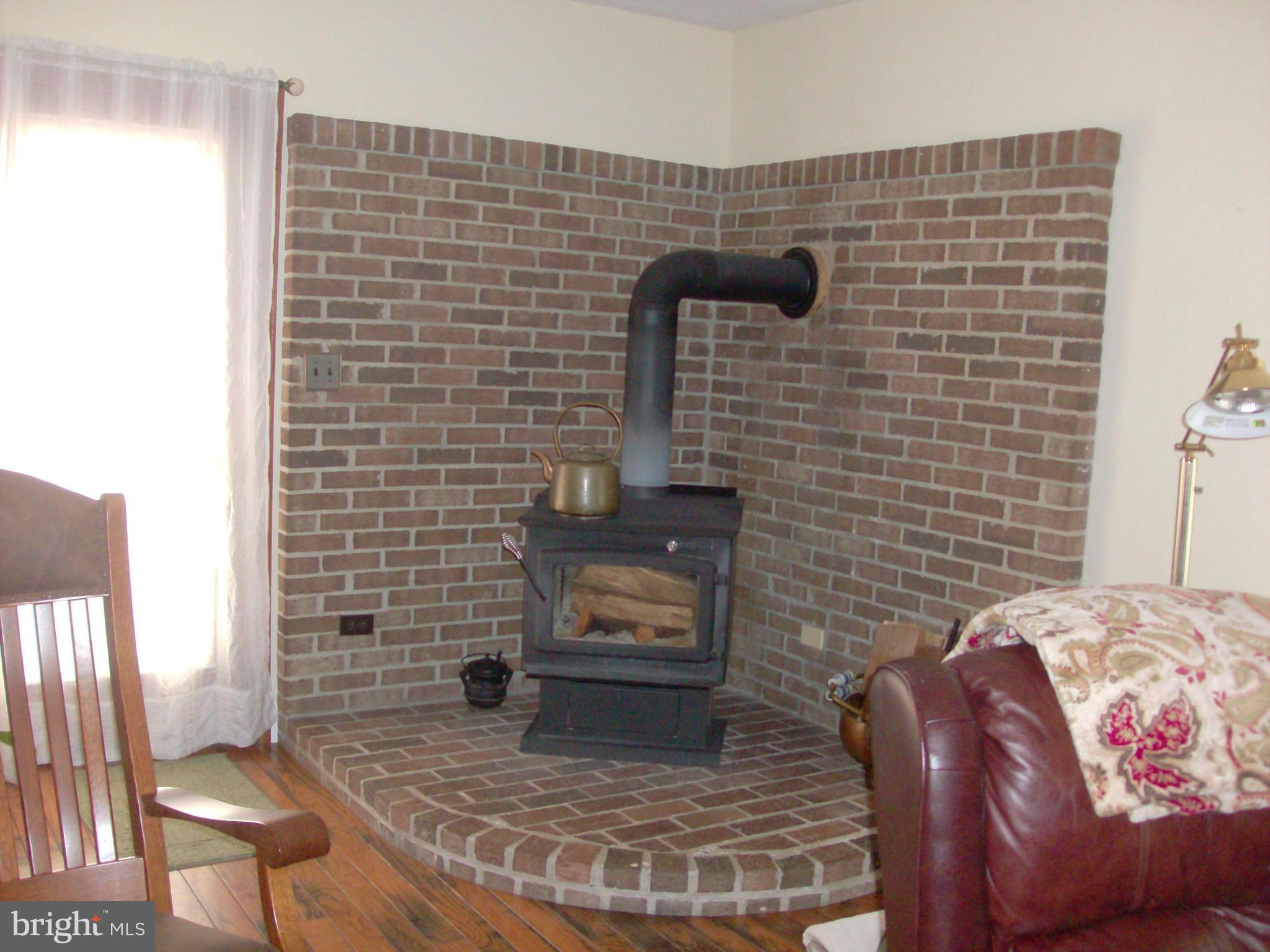 9425 Mackall Road St. Leonard, MD 20685 - Photo 11 of 26 Wood Stove