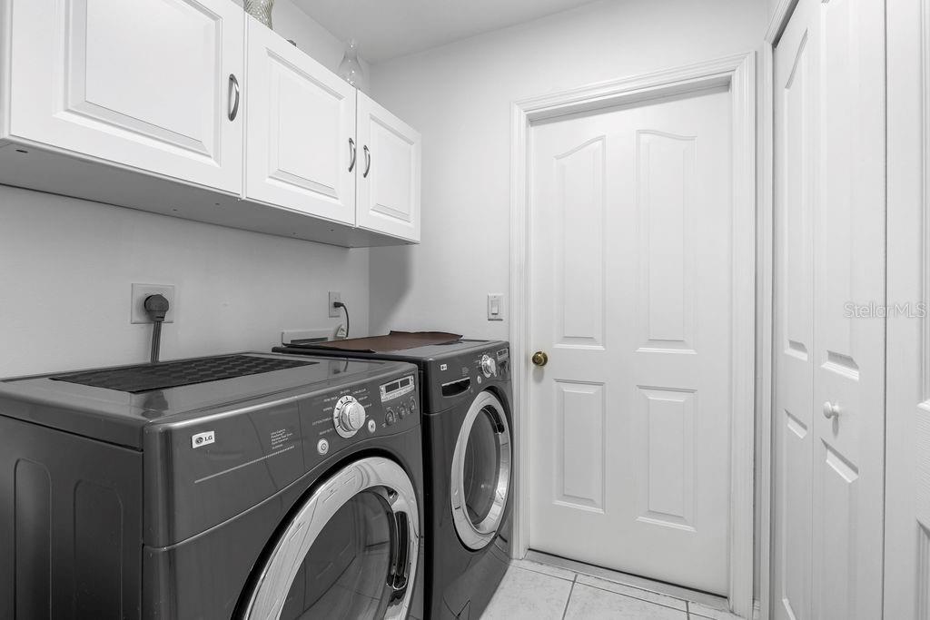 10360 Southwest 48th Avenue Ocala, FL 34476 - Photo 16 of 25 a utility room with dryer and washer