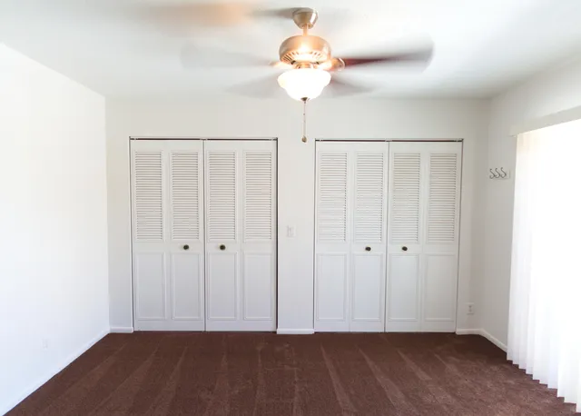 a view of room with wooden floor
