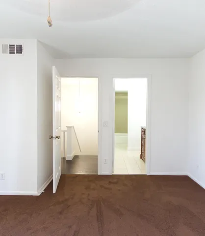 a view of a room with an empty space