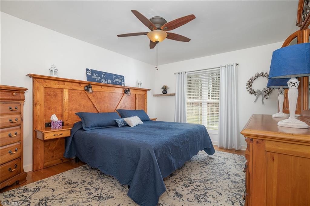 2511 Pleasant Ridge Road Summerfield, NC 27358 - Photo 13 of 31 {Primary Bedroom