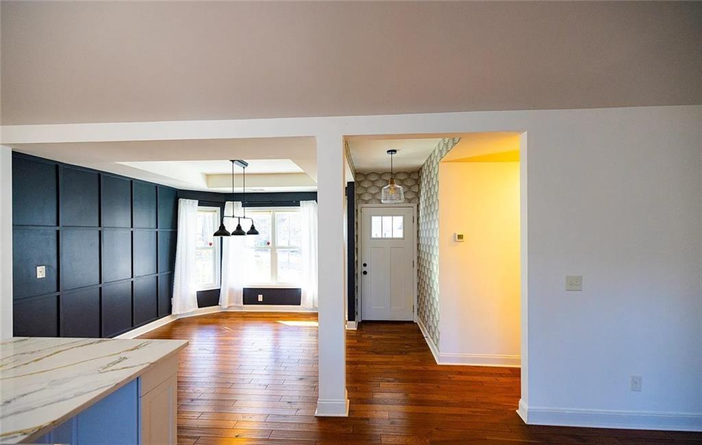 4110 Doubletree Court Cumming, GA 30040 - Photo 17 of 37 a view of a kitchen with a sink and a refrigerator