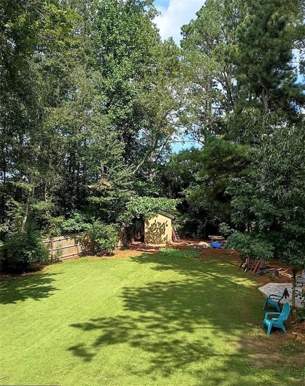 4110 Doubletree Court Cumming, GA 30040 - Photo 19 of 37 a view of a golf course with chairs