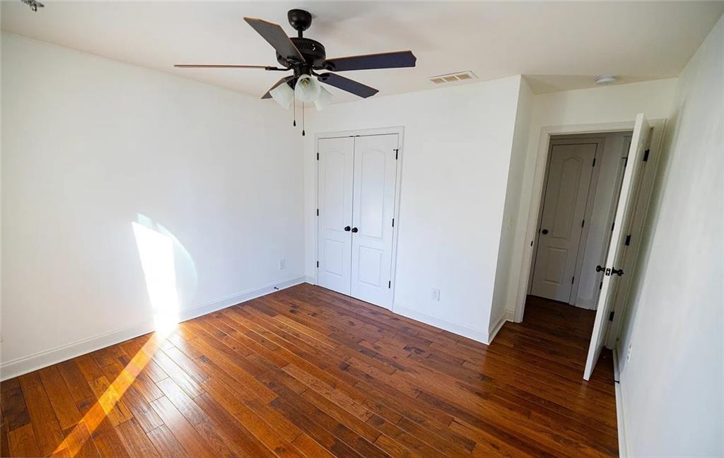 4110 Doubletree Court Cumming, GA 30040 - Photo 33 of 37 wooden floor in an empty room