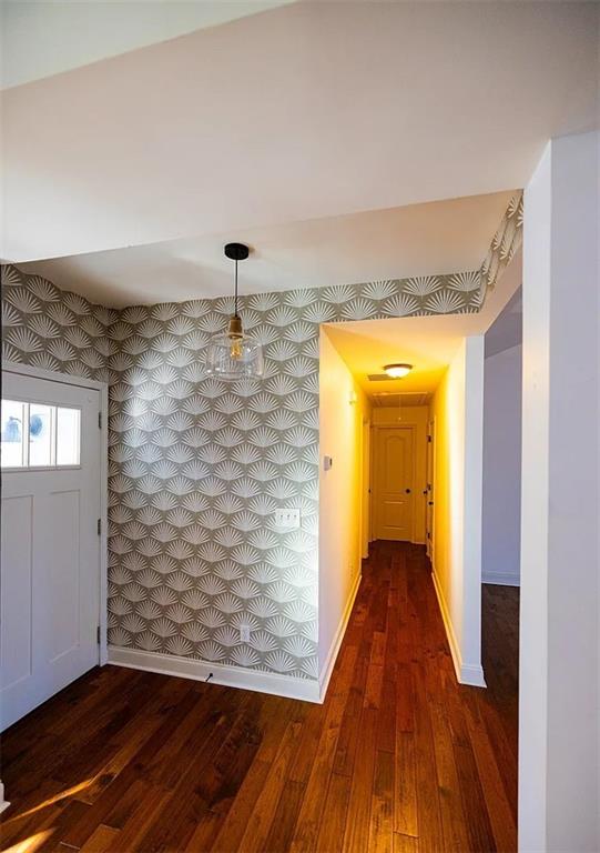 4110 Doubletree Court Cumming, GA 30040 - Photo 34 of 37 a view of a hallway with wooden floor and a bathroom