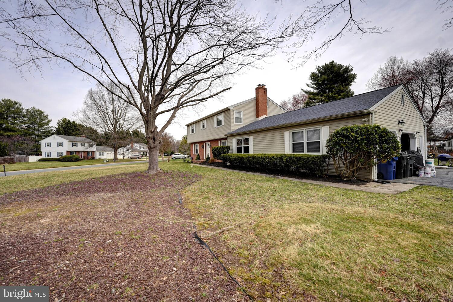 55 Beloit Avenue Dover, DE 19901 - Photo 1 of 54 a front view of a house with a yard and garage