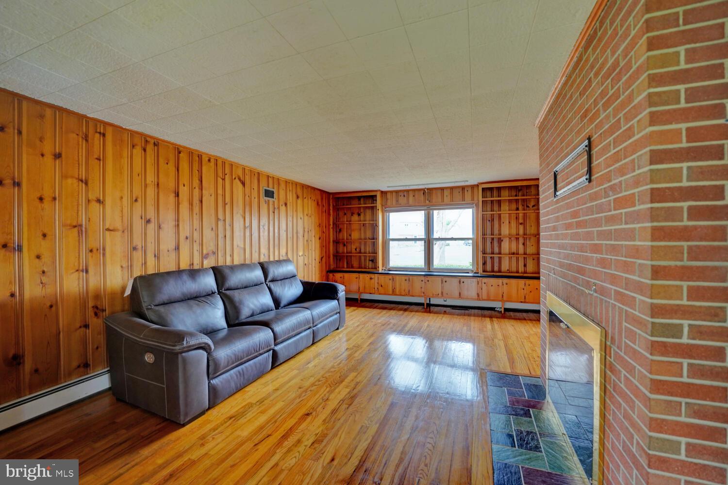 55 Beloit Avenue Dover, DE 19901 - Photo 27 of 54 a living room with furniture and wooden floor