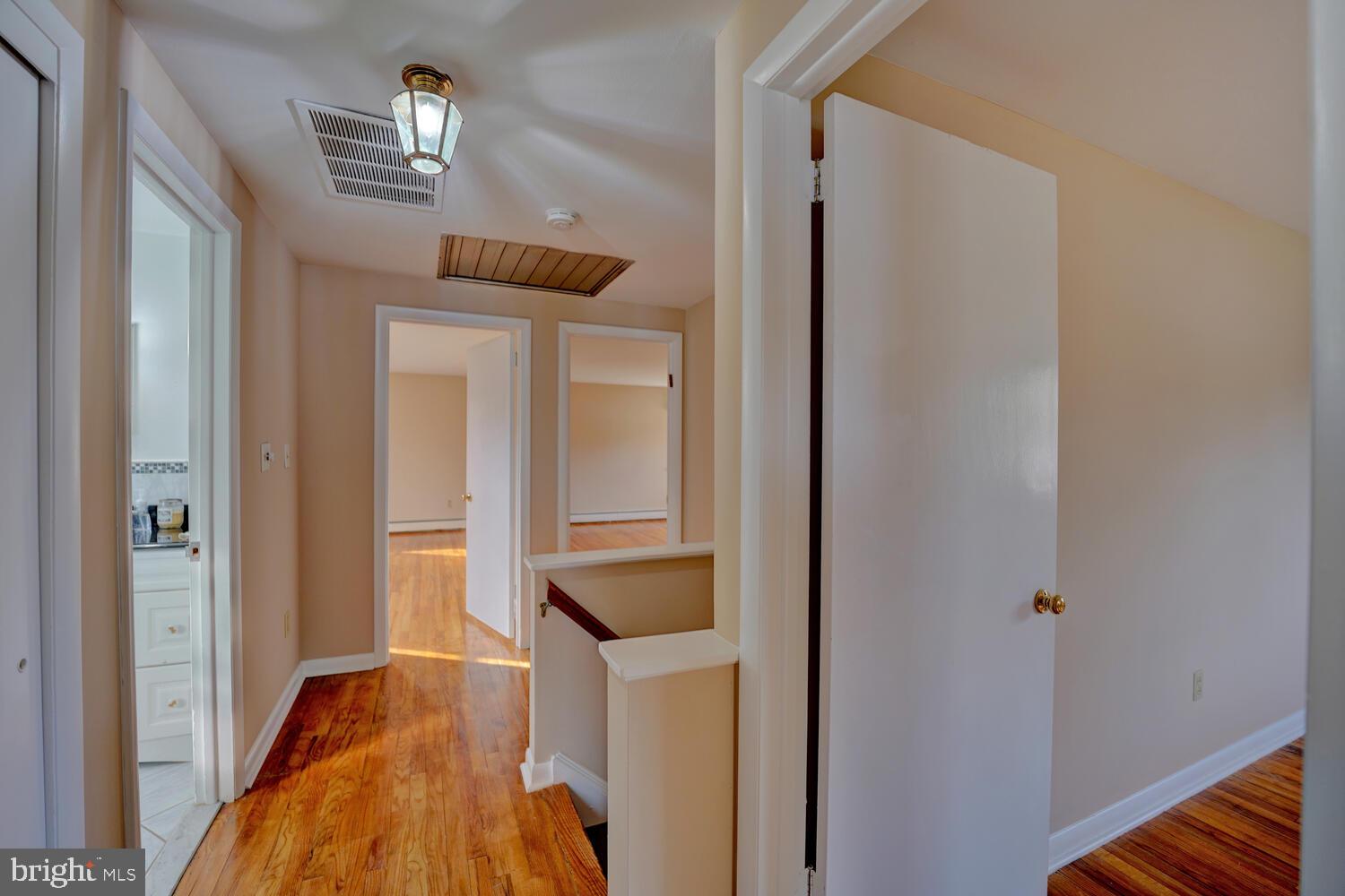 55 Beloit Avenue Dover, DE 19901 - Photo 32 of 54 a view of hallway with wooden floor