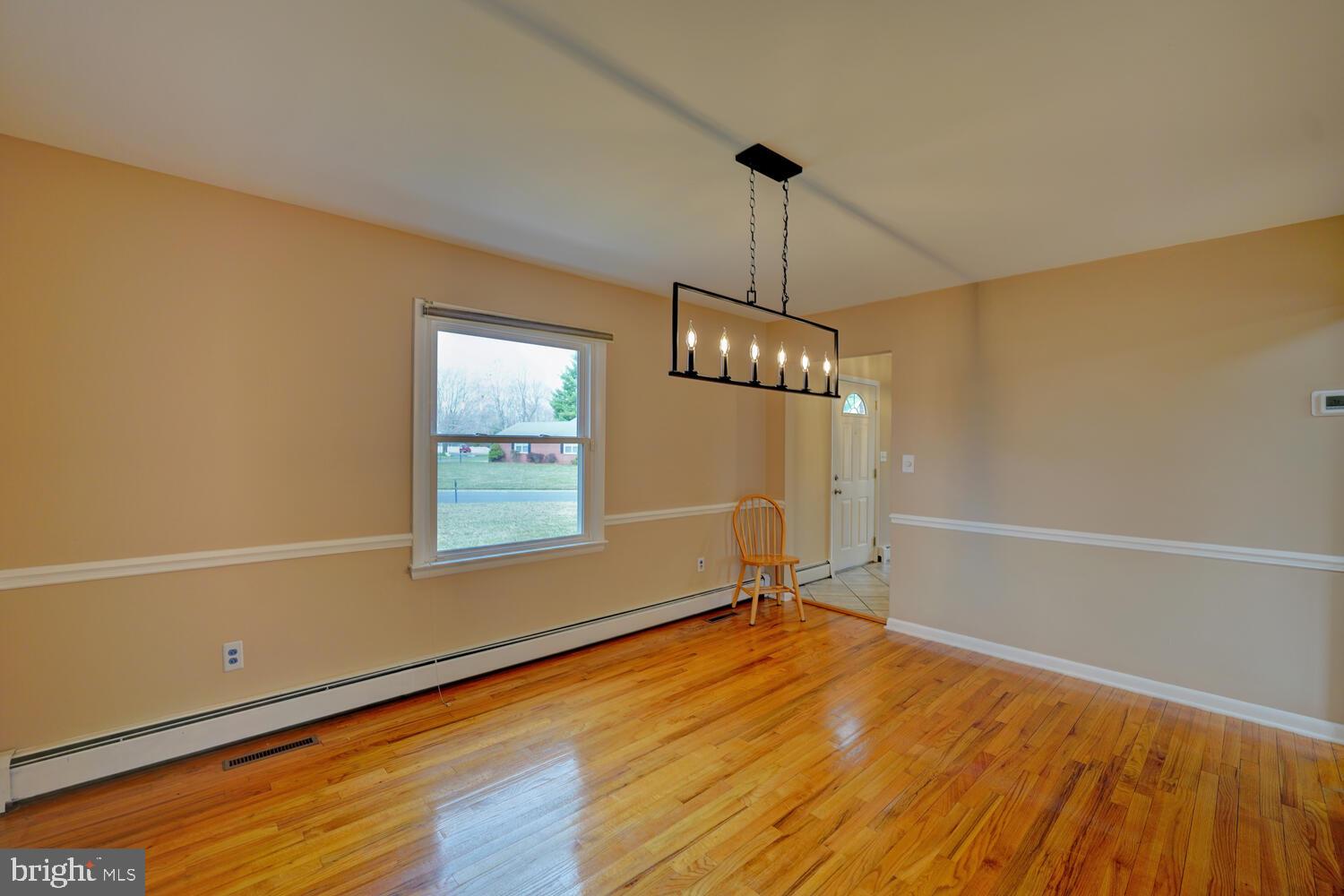 55 Beloit Avenue Dover, DE 19901 - Photo 10 of 54 a view of a room with gym equipment and wooden floor