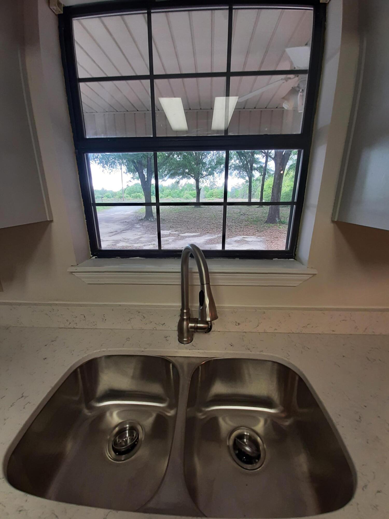 6197 Barnes Road Crestview, FL 32536 - Photo 16 of 35 a close view of sink and window