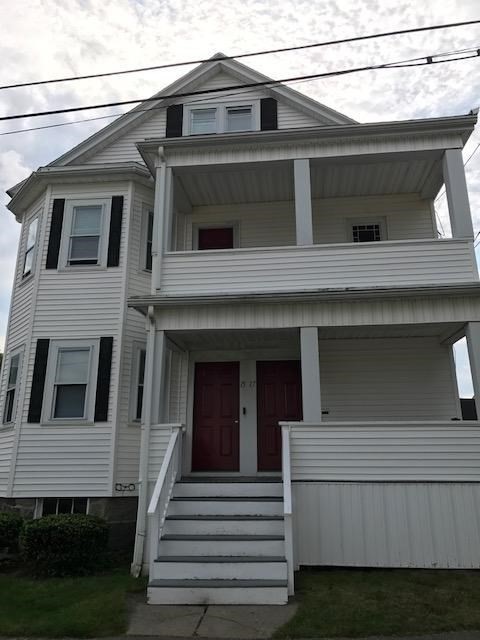 a view of a house with a window and stairs