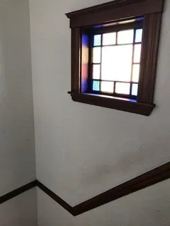 a view of a window in an empty room