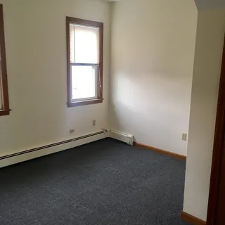 an empty room with a door