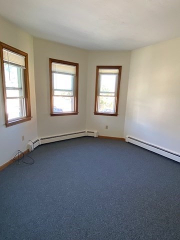 17 Grafton Street, Unit 2 Quincy, MA 02169 - Photo 18 of 25 an empty room with a window