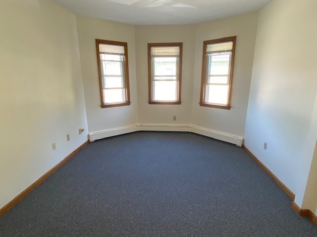 17 Grafton Street, Unit 2 Quincy, MA 02169 - Photo 19 of 25 an empty room with windows