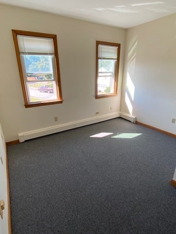 17 Grafton Street, Unit 2 Quincy, MA 02169 - Photo 21 of 25 a view of an empty room with a window