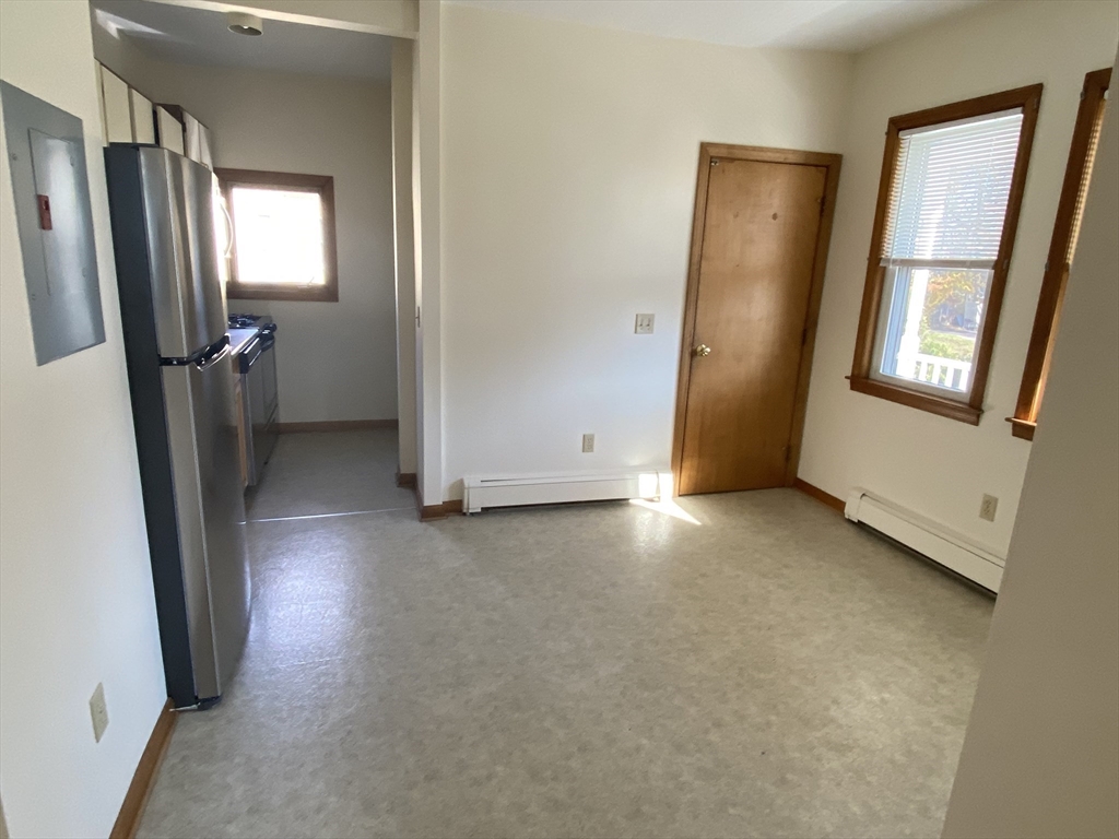 17 Grafton Street, Unit 2 Quincy, MA 02169 - Photo 24 of 25 an empty room with windows and closet
