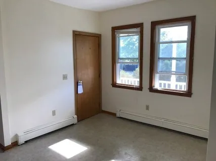 an empty room with a window