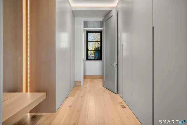 a view of a bedroom from a hallway