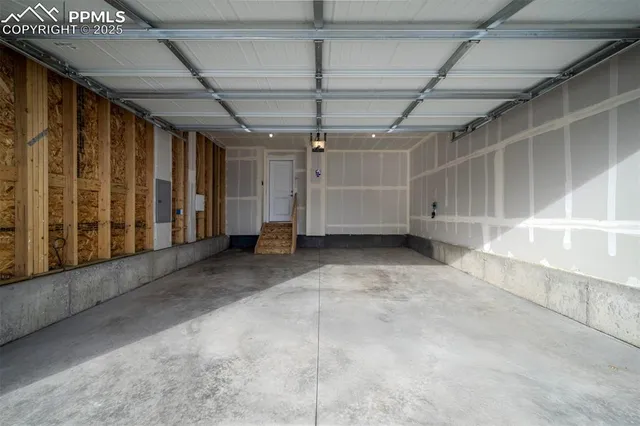 a view of empty room with stairs