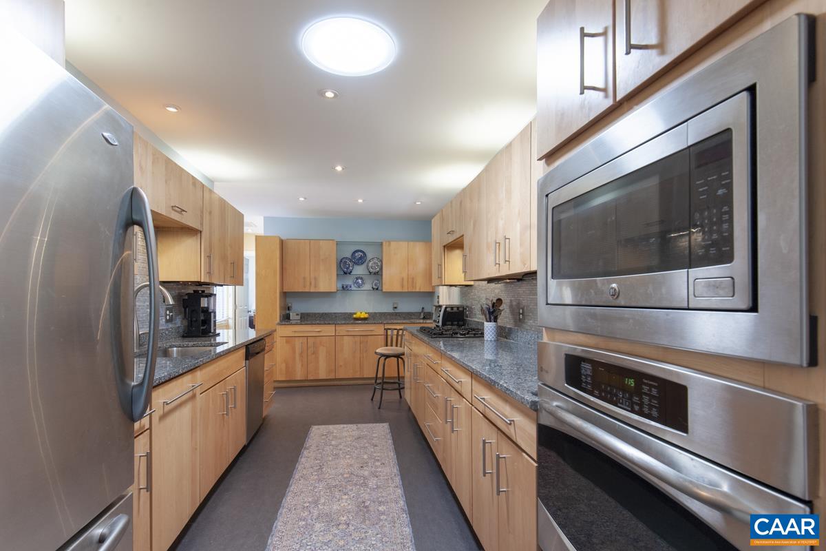 2306 Tarleton Drive Charlottesville, VA 22901 - Photo 16 of 35 a kitchen with stainless steel appliances and sink