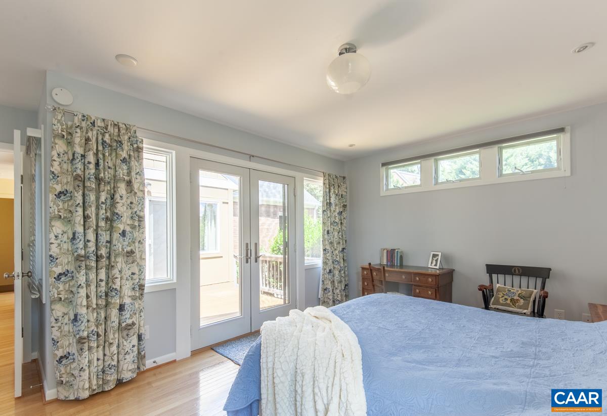 2306 Tarleton Drive Charlottesville, VA 22901 - Photo 18 of 35 a bedroom with a bed and a window