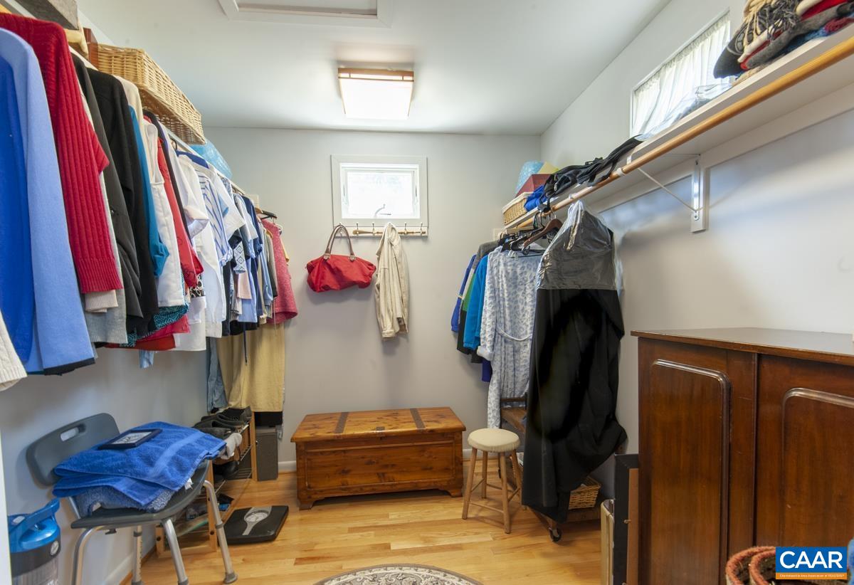 2306 Tarleton Drive Charlottesville, VA 22901 - Photo 22 of 35 a view of walk in closet with clothes and shoes