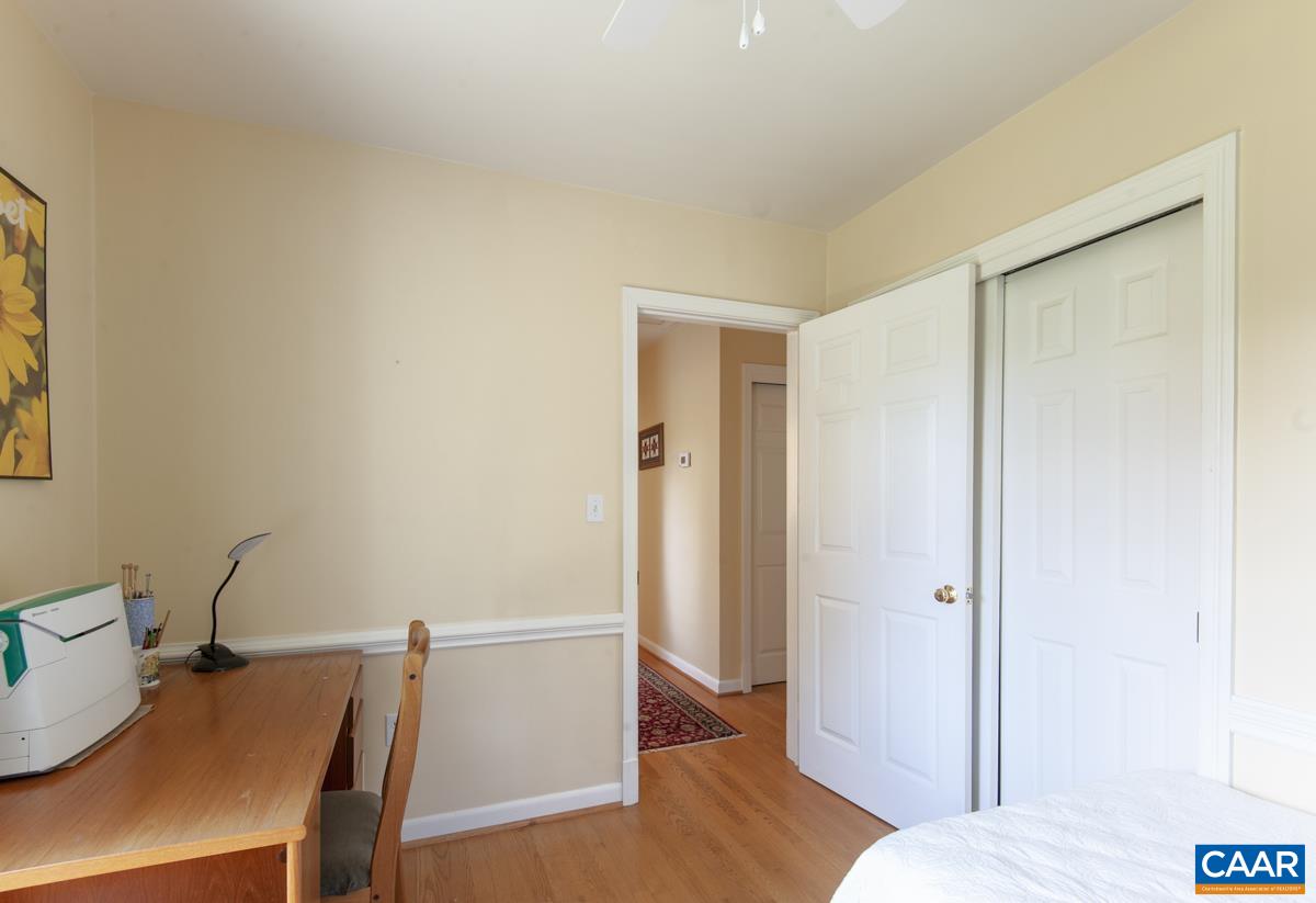 2306 Tarleton Drive Charlottesville, VA 22901 - Photo 24 of 35 a view of a room with wooden floor and furniture