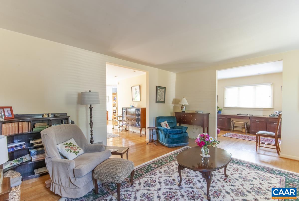2306 Tarleton Drive Charlottesville, VA 22901 - Photo 9 of 35 a living room with furniture and a potted plant