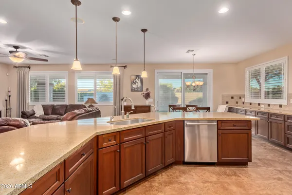 a kitchen with lots of counter space sink and appliances