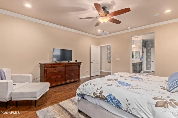 a bedroom with a bed and furniture