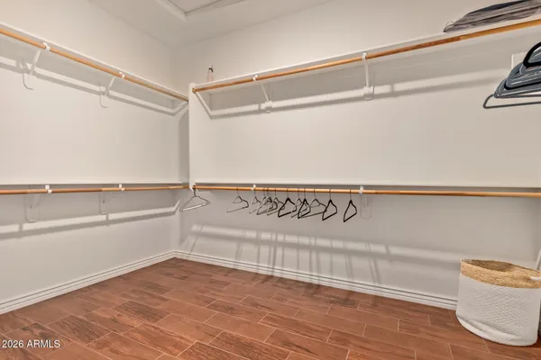 a view of an empty walk in closet