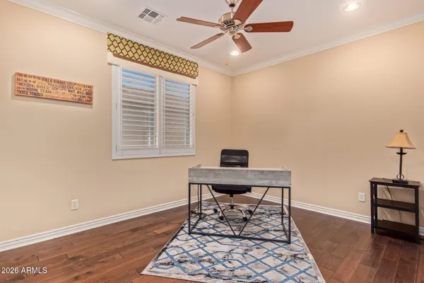 a workspace with wooden floor