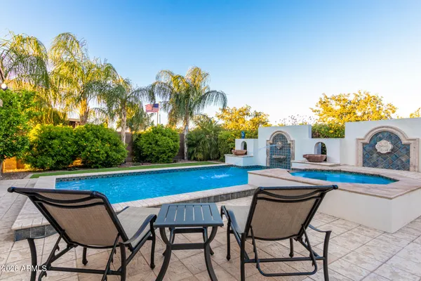 a table and chairs in the patio