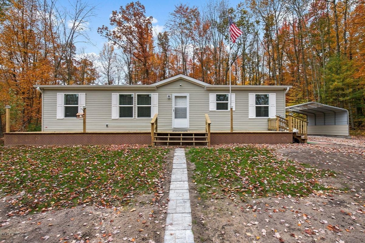 22733 Cutler Road Howard City, MI 49329 - Photo 1 of 20 59907A81-6188-4A07-B6FD-B6C5A8758B4E