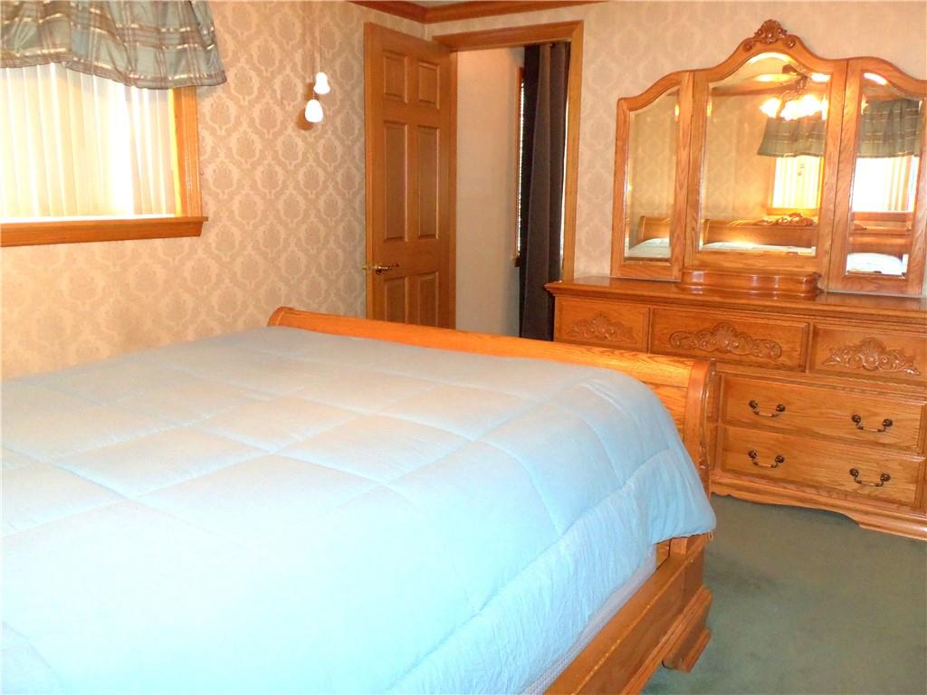 306 Silver Maple Avenue Langeloth, PA 15054 - Photo 15 of 31 a bedroom with a bed and a window