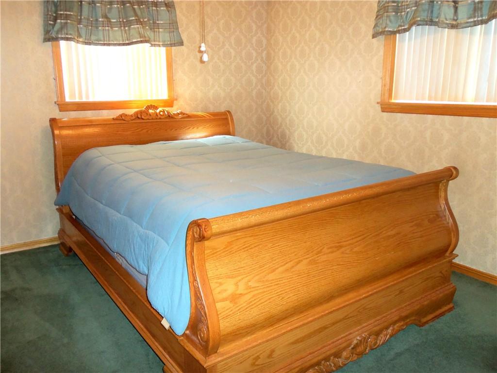 306 Silver Maple Avenue Langeloth, PA 15054 - Photo 16 of 31 a blue bed sitting in a bedroom next to a window