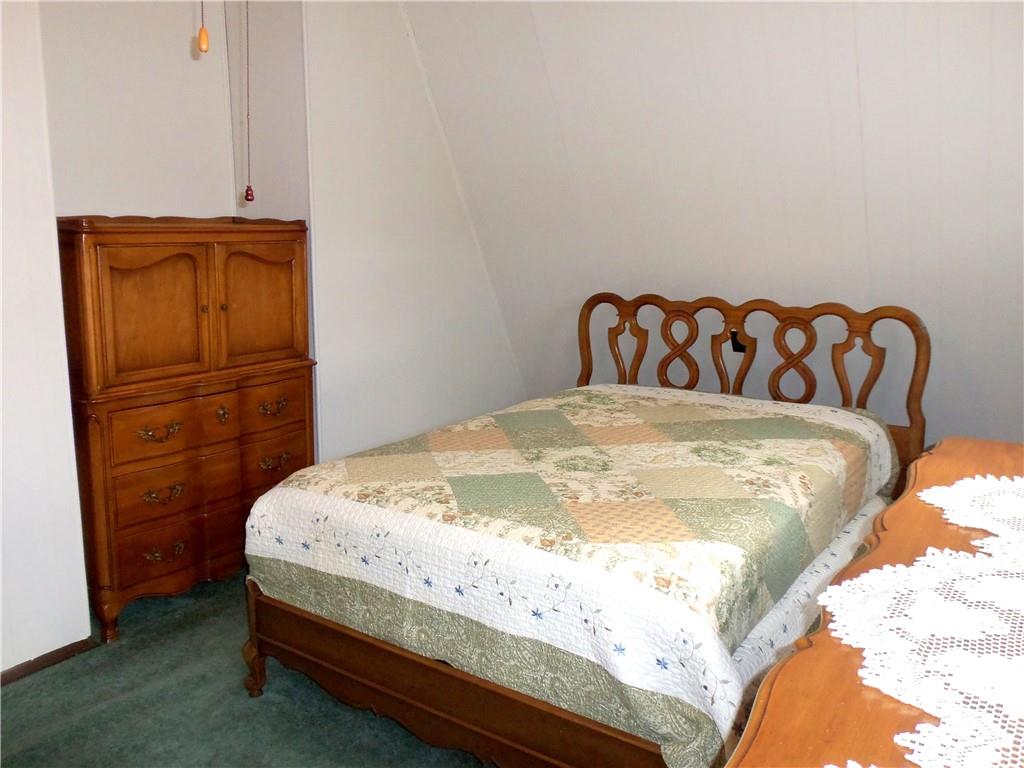 306 Silver Maple Avenue Langeloth, PA 15054 - Photo 17 of 31 a bed sitting in a bedroom and dresser