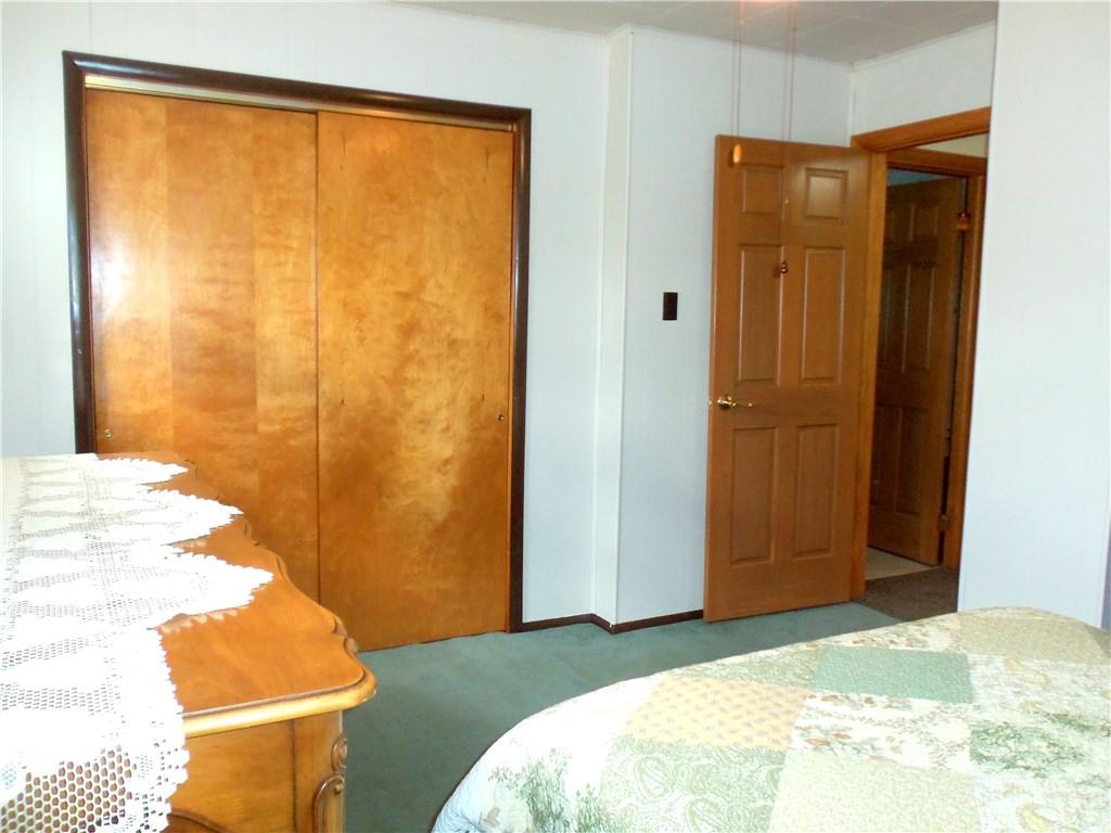 306 Silver Maple Avenue Langeloth, PA 15054 - Photo 18 of 31 a bedroom with a bed and a chair