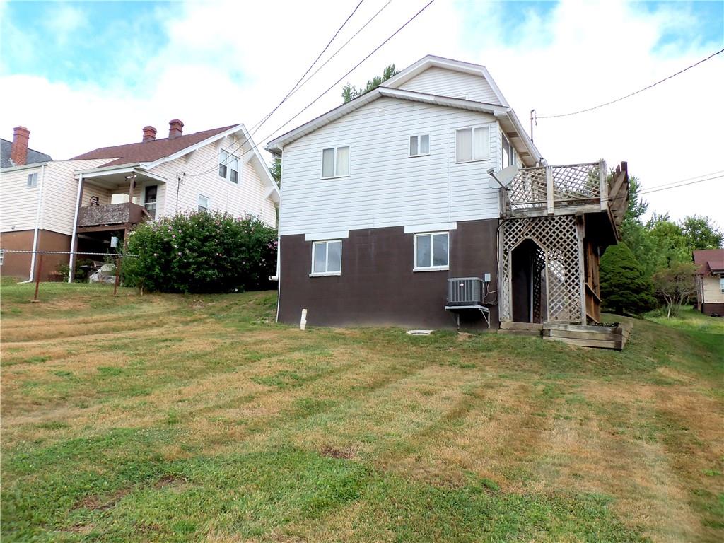 306 Silver Maple Avenue Langeloth, PA 15054 - Photo 29 of 31 a front view of a house with garden