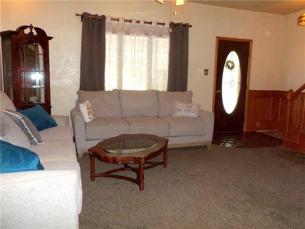 306 Silver Maple Avenue Langeloth, PA 15054 - Photo 6 of 31 a living room with furniture and a mirror