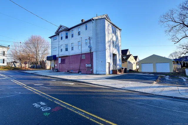 a view of a building with a street