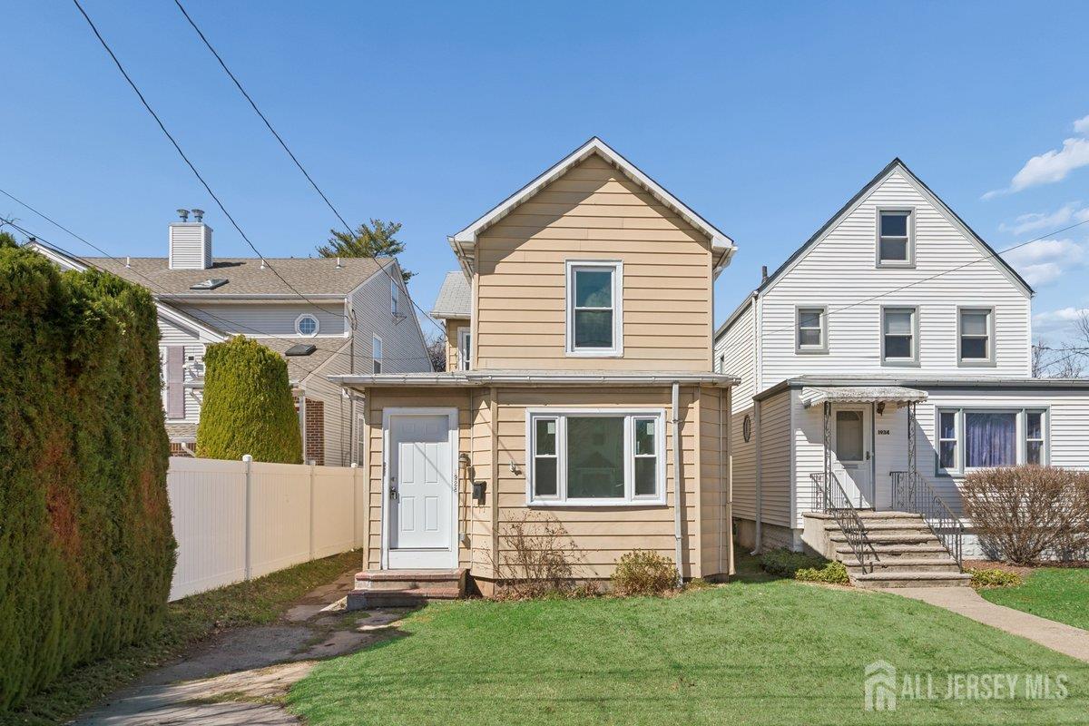 1928 Bond Street Rahway, NJ 07065 - Photo 1 of 1 a front view of a house with a yard